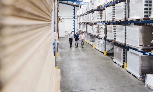 Business people meeting in company storehouse